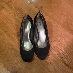 Black wedge heel shoes.